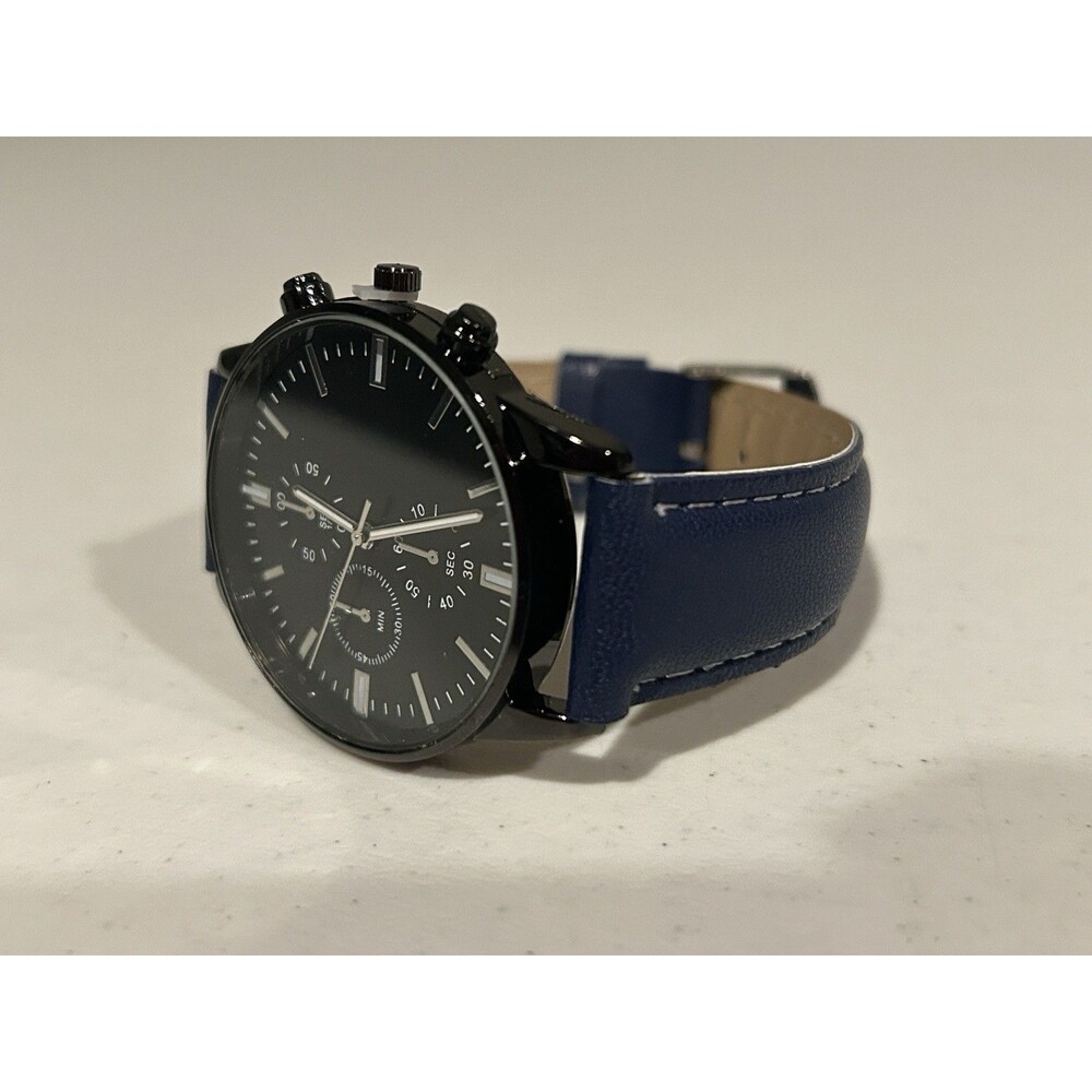 Geneva men's watch with a black case and a blue faux leather strap.